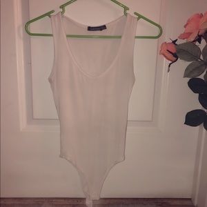 White, cotton body suit